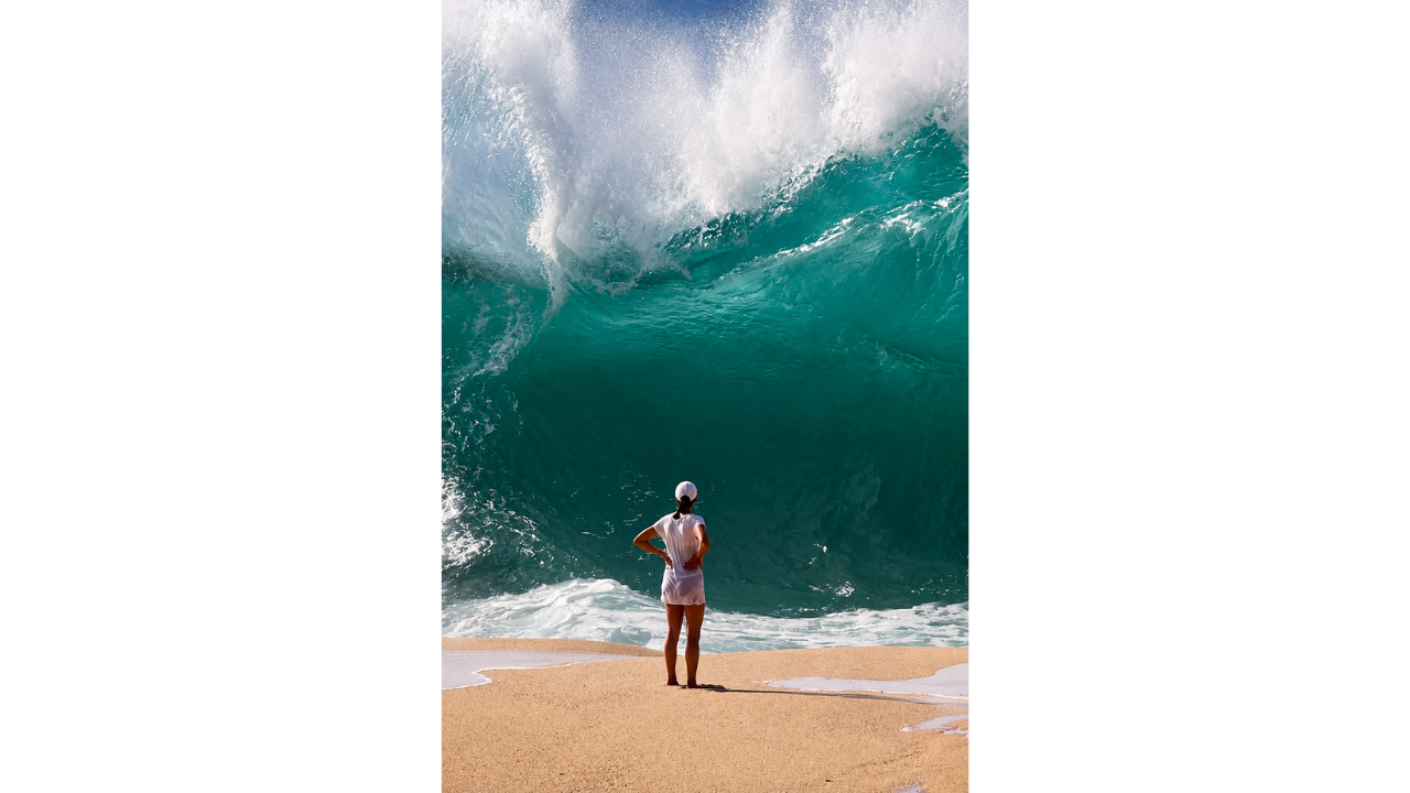 6. Beach wave arrives for the photo