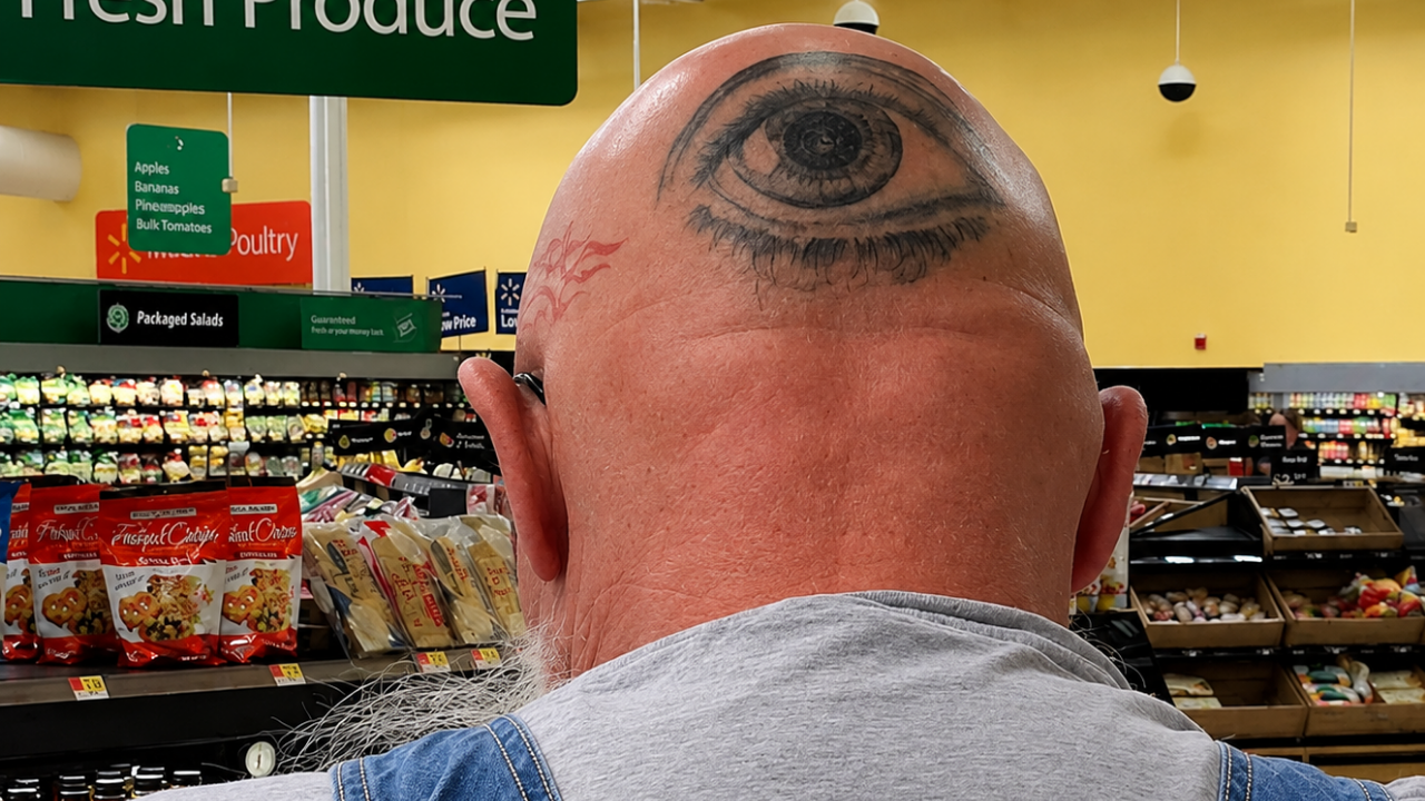 7. The Tattoo That Watched Behind Him