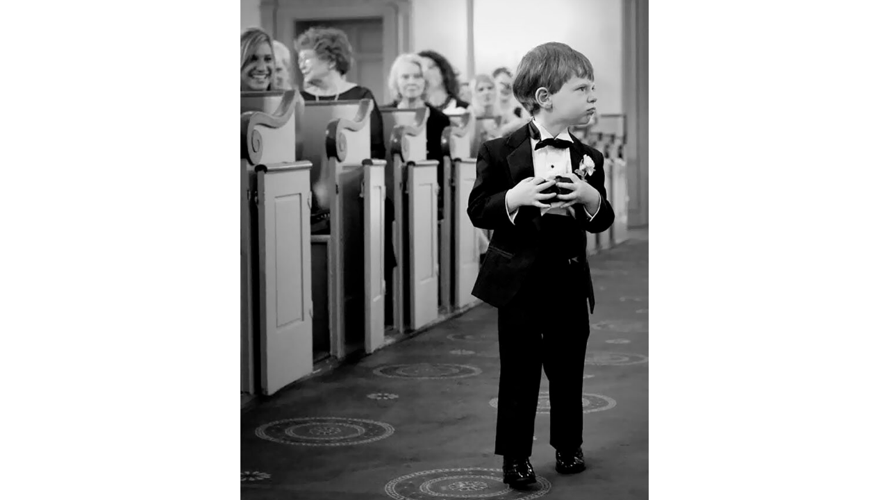 12. A ring bearer with a very honest face